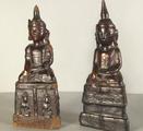 35. A pair of unusual lacquered wood seated deities..